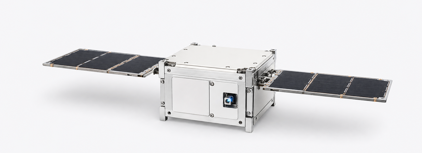 CubeSat with deployed solar panels and a fiber optic port